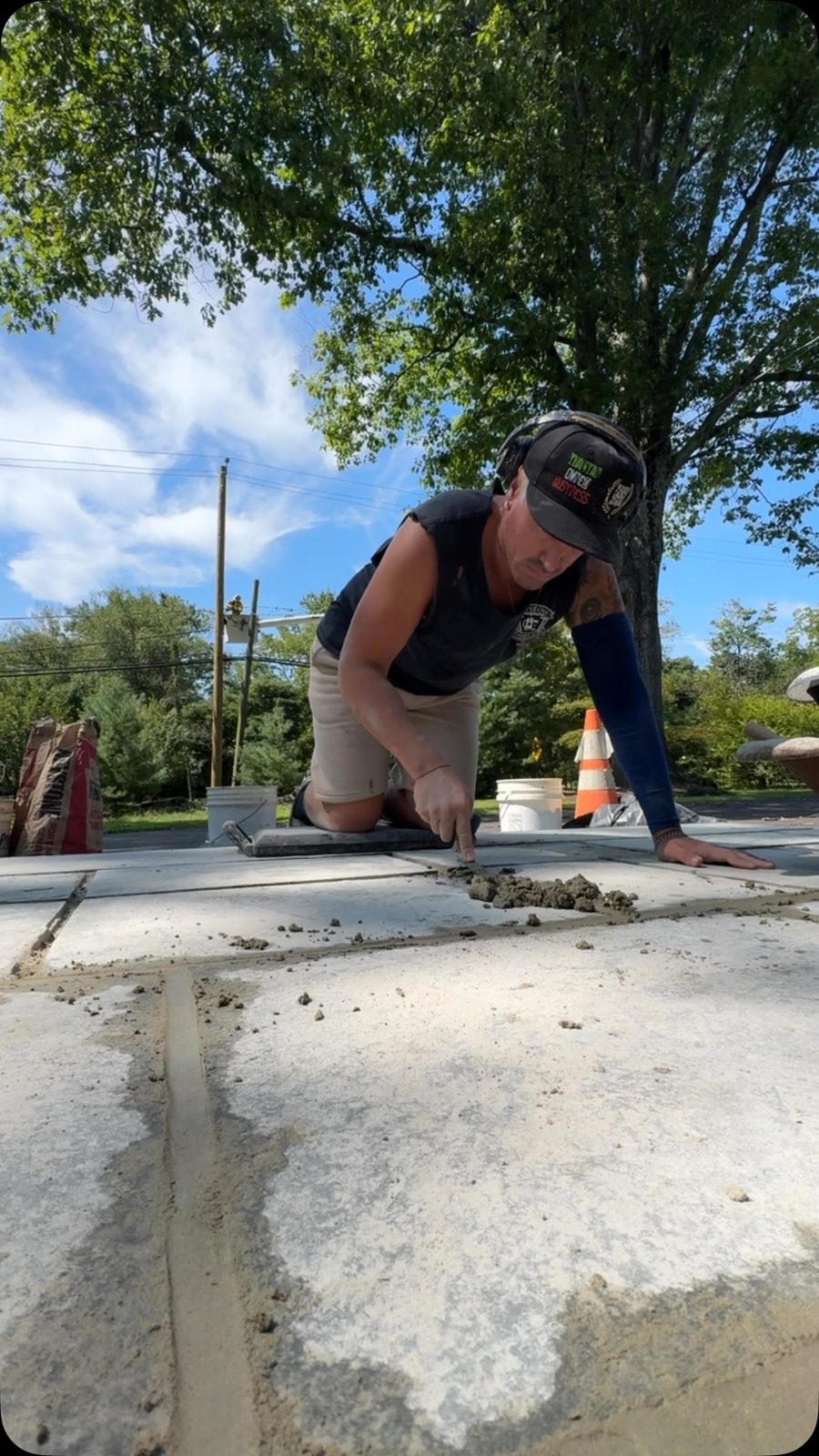 Alex Sansalone restoring a flagstone patio on a Bucks County job site